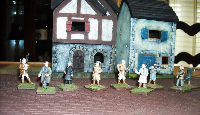 Cannon Fodder IRA miniatures. Miniature Building Authority buildings and cobblestone plaza.