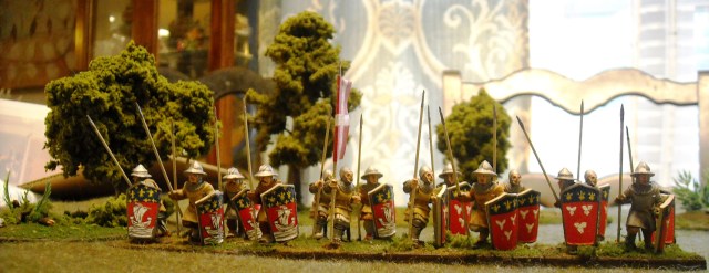 16 Old Glory pavisiers.  The standard is the cross of St. Denis.  Kind of the reverse of the cross of St. George.  The Paris spearmen are on the left. 