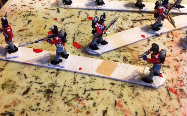 Photo shows my bayonet glue job (center) and busted musket (right.)  These occurred through casual handling.  In fact the bayonet ibreakage occurred during painting. 