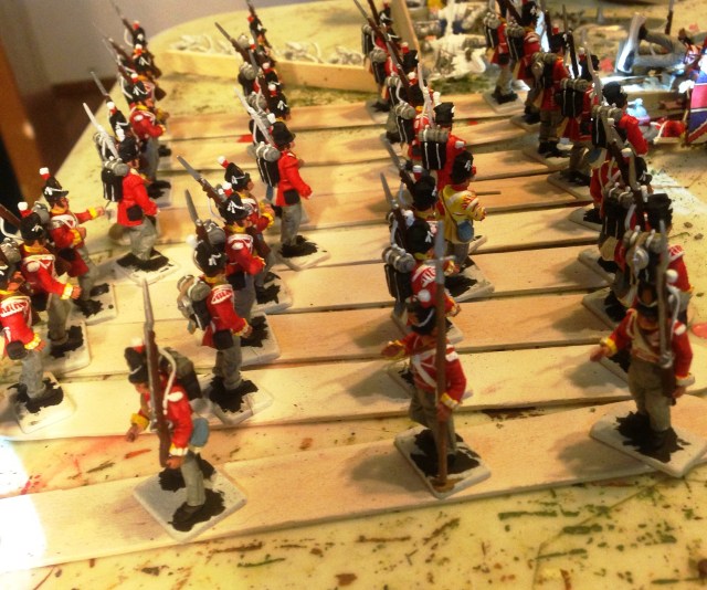 The 44th Regiment waits to be mounted and flagged.  There is an extra stand not quite finished in the middle of my painting sticks.