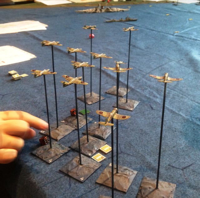 Failing their navigation role, the FAA planes plan their course across the board to hit the Tirpitz
