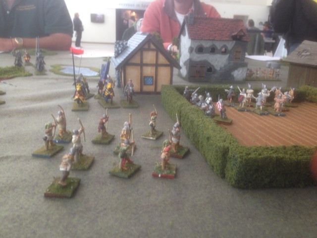 English longbowmen confront French mounted troops 