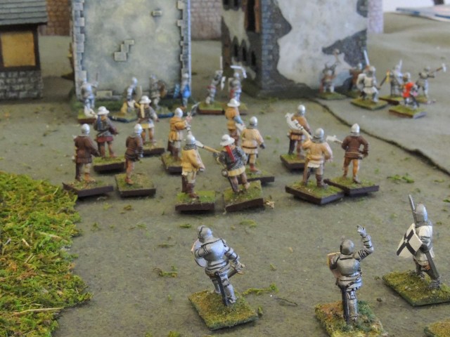 A tighter shot of the English assault on Agen town. They successfully drove the peasants out of the buildings and burned them, but didn't try to take the castle. , 