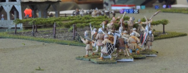 French sergeants take shelter behind the vineyards. 