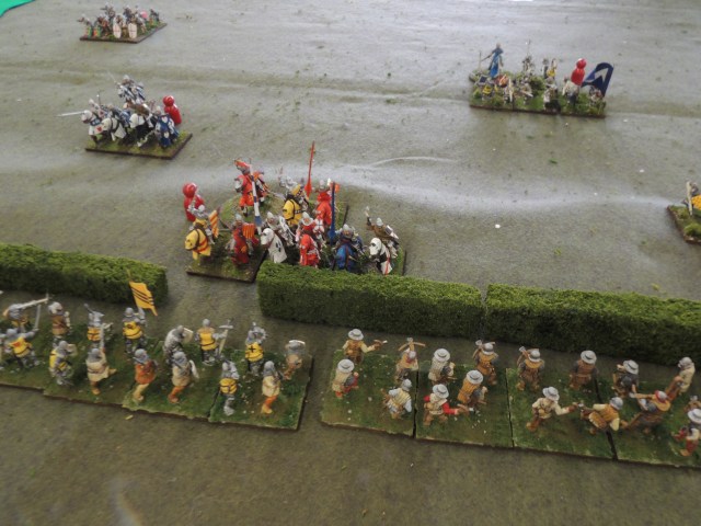 Marshal Clermont tries to coax his shaken mounted men-at-arms across the hedge to attack the English dismounted knights.  They don't seem to want to follow. 